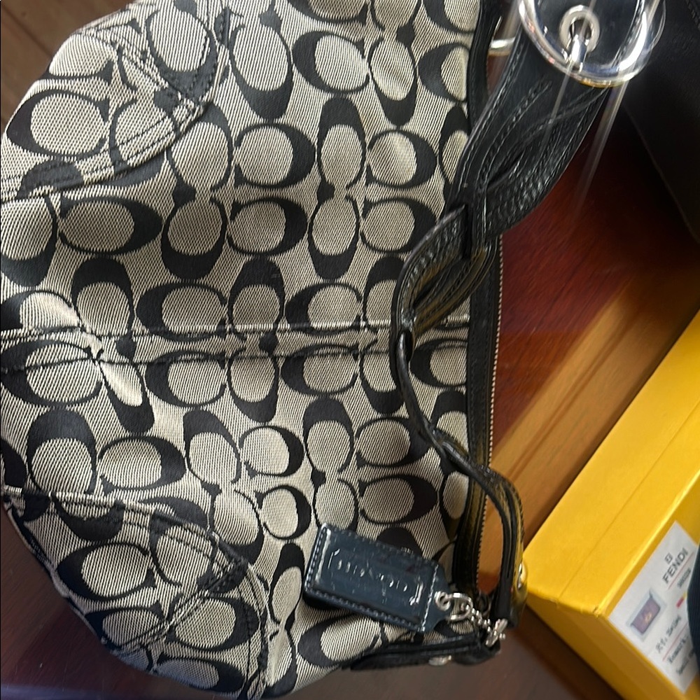 Coach Black and Cream Shoulder Bag with Sophisticated Design